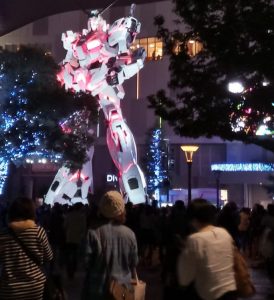 The author attempted to immortalize the sensorial feelings of lights and sight upon seeing the Gundam Robot in Japan during her visit there. To her, this is a participatory sensory experience as she chose to enjoy the scene.